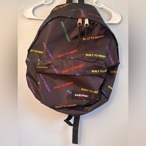 Eastpak Black Backpack with Multicolor "Built to Resist" Print